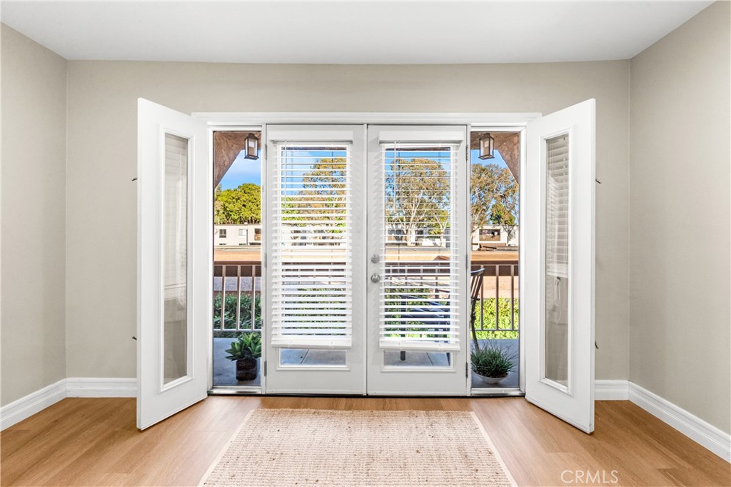 Living room balcony - 6600 Warner Avenue 151, Huntington Beach CA 92647 - photo 15