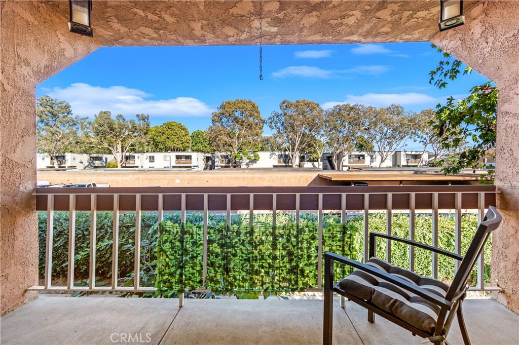 Living room balcony - 6600 Warner Avenue 151, Huntington Beach CA 92647 - photo 16