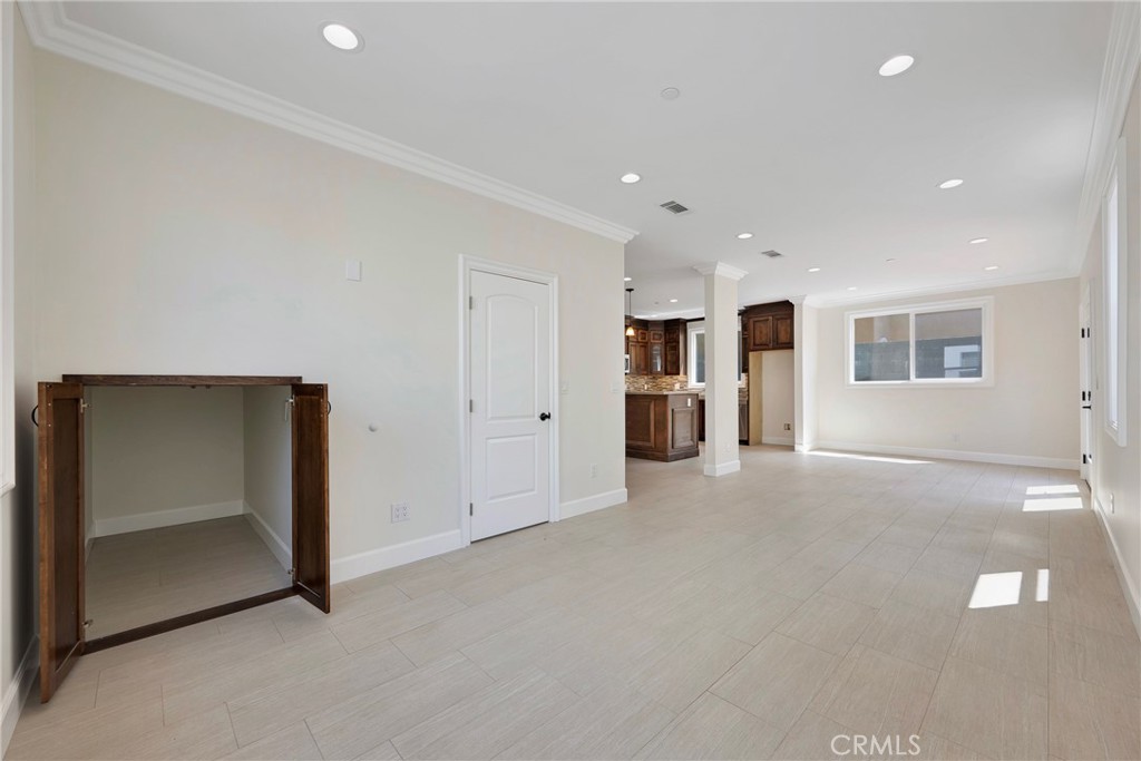 Open Floor Plan. Living Room, Dining Area & Kitchen - 7776 Liberty, Huntington Beach CA 92647 - photo 9