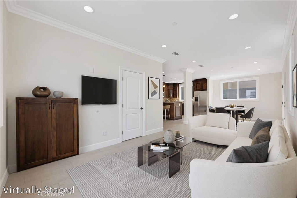 Living Room, Dining Area. Virtually Staged. - 7776 Liberty, Huntington Beach CA 92647 - photo 10