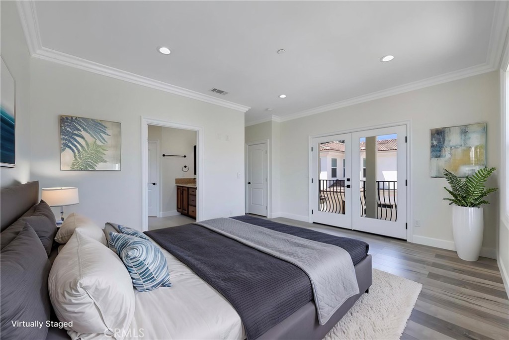 Luxury Primary Bedroom with Balcony. Virtually Staged - 7776 Liberty, Huntington Beach CA 92647 - photo 27