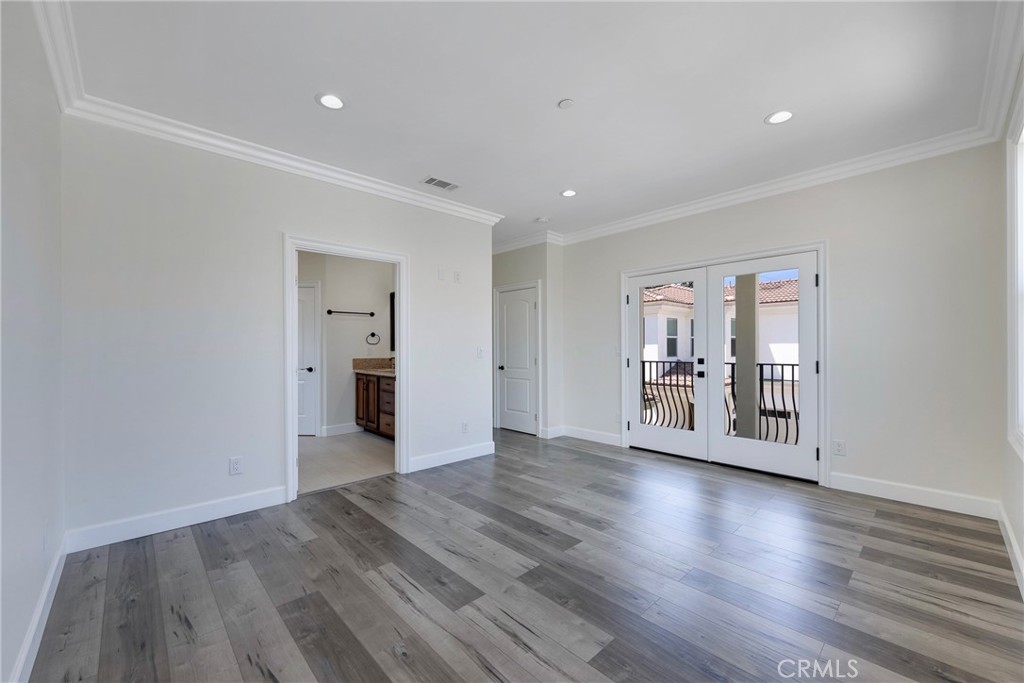 Luxury Primary Bedroom with Balcony - 7776 Liberty, Huntington Beach CA 92647 - photo 31