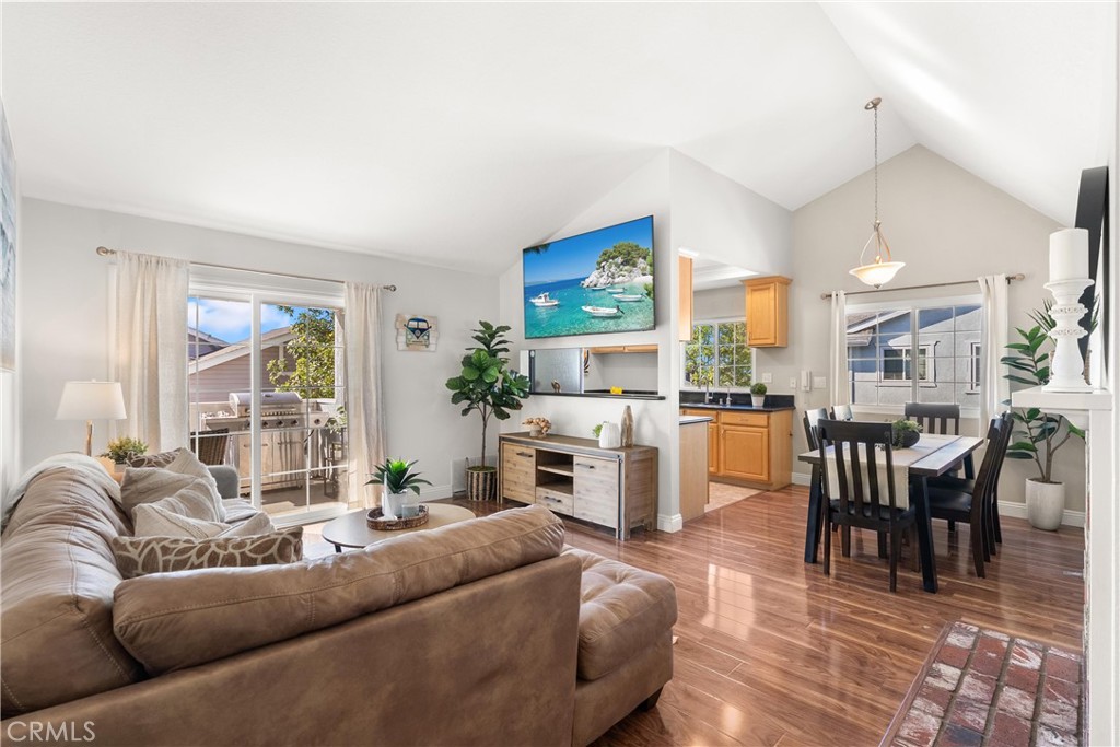 Excellent open floor plan with high ceilings, new windows, new sliding doors and plenty of natural light! - 7841 Essex Drive 201, Huntington Beach CA 92648 - photo 1