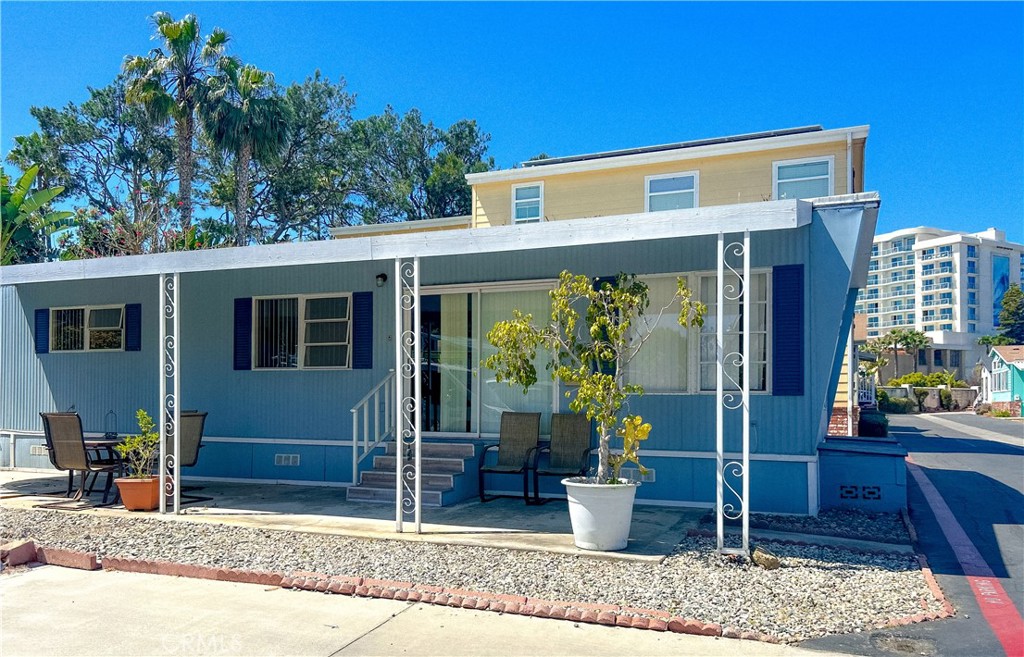 Corner lot, with shaded patio steps from the beach - 80 Huntington Street 707, Huntington Beach CA 92648 - photo 1