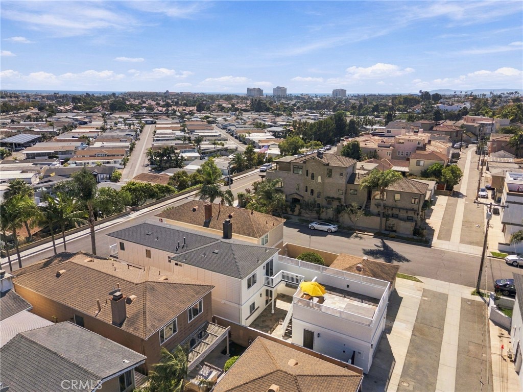 Elevated perspective highlights the home's coastal Huntington Beach setting and surrounding neighborhood. - 803 Frankfort Avenue, Huntington Beach CA 92648 - photo 5