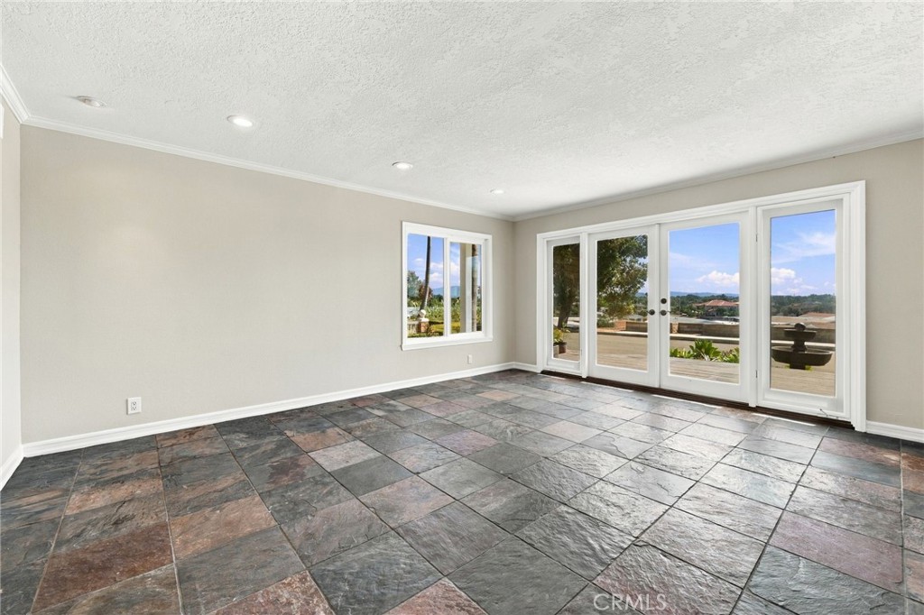 Another living-room perspective highlights the home's spacious layout and abundant natural light. - 803 Frankfort Avenue, Huntington Beach CA 92648 - photo 13