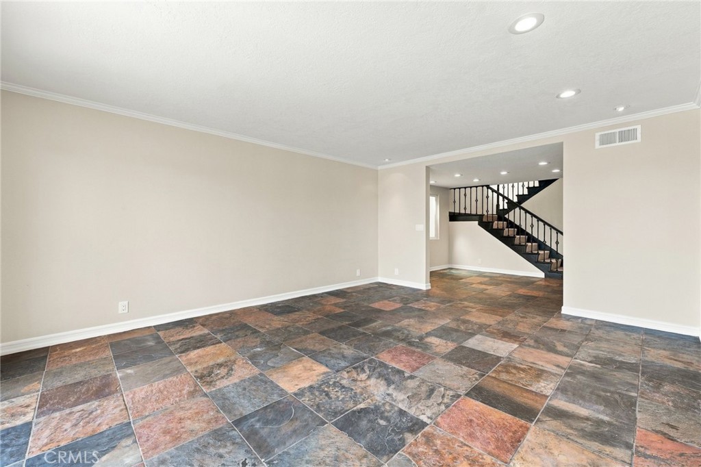 The main level offers a comfortable flow between the living, dining, kitchen, and family spaces. - 803 Frankfort Avenue, Huntington Beach CA 92648 - photo 14