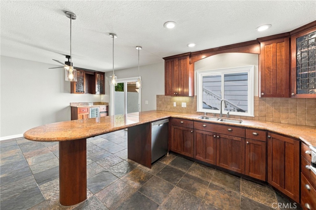 Large peninsula provides additional prep space and casual bar seating. - 803 Frankfort Avenue, Huntington Beach CA 92648 - photo 24