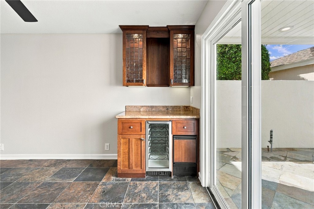 Built-in dry bar adds convenient storage and serving space just off the main living areas. - 803 Frankfort Avenue, Huntington Beach CA 92648 - photo 25