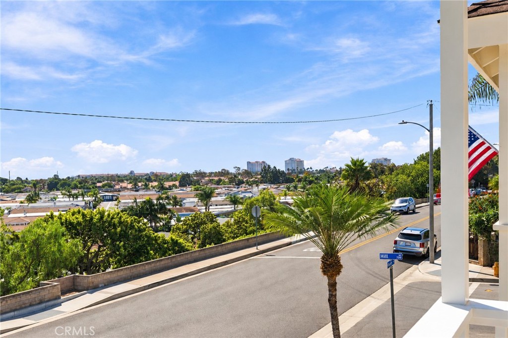 Primary balcony captures unobstructed ocean-facing views and spectacular sunset skies and a front seat for the annual ai - 803 Frankfort Avenue, Huntington Beach CA 92648 - photo 39