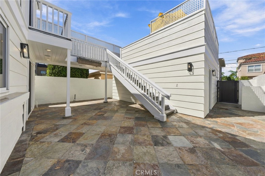 Block-wall privacy and generous patio space create another flexible outdoor entertaining area. - 803 Frankfort Avenue, Huntington Beach CA 92648 - photo 53