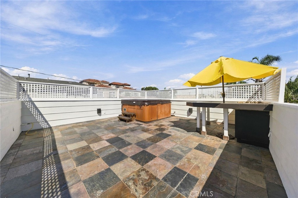 Large deck above the detached garage creates a unique additional outdoor retreat. - 803 Frankfort Avenue, Huntington Beach CA 92648 - photo 56