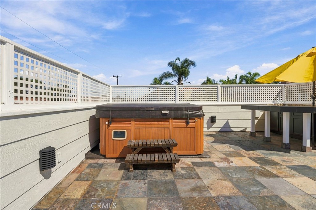 Elevated deck features a private spa and ample room for outdoor entertaining. - 803 Frankfort Avenue, Huntington Beach CA 92648 - photo 57