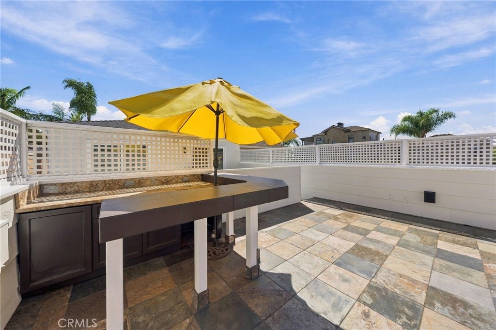 Built-in bar area and existing gas line provide an excellent foundation for outdoor entertaining. - 803 Frankfort Avenue, Huntington Beach CA 92648 - photo 59