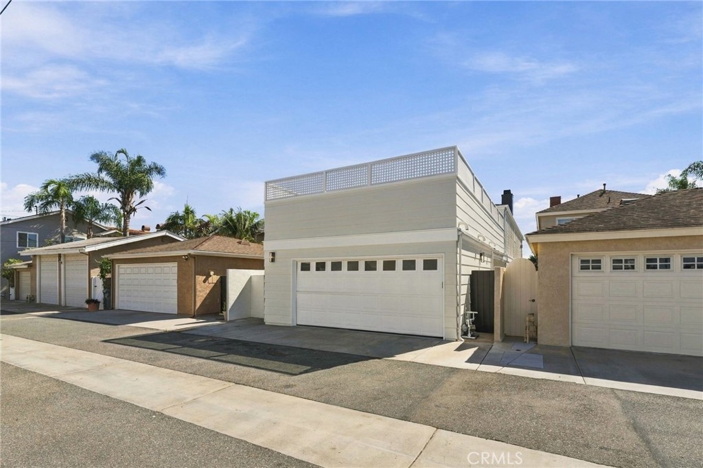 Detached garage provides convenient off-street parking and valuable additional space. - 803 Frankfort Avenue, Huntington Beach CA 92648 - photo 64