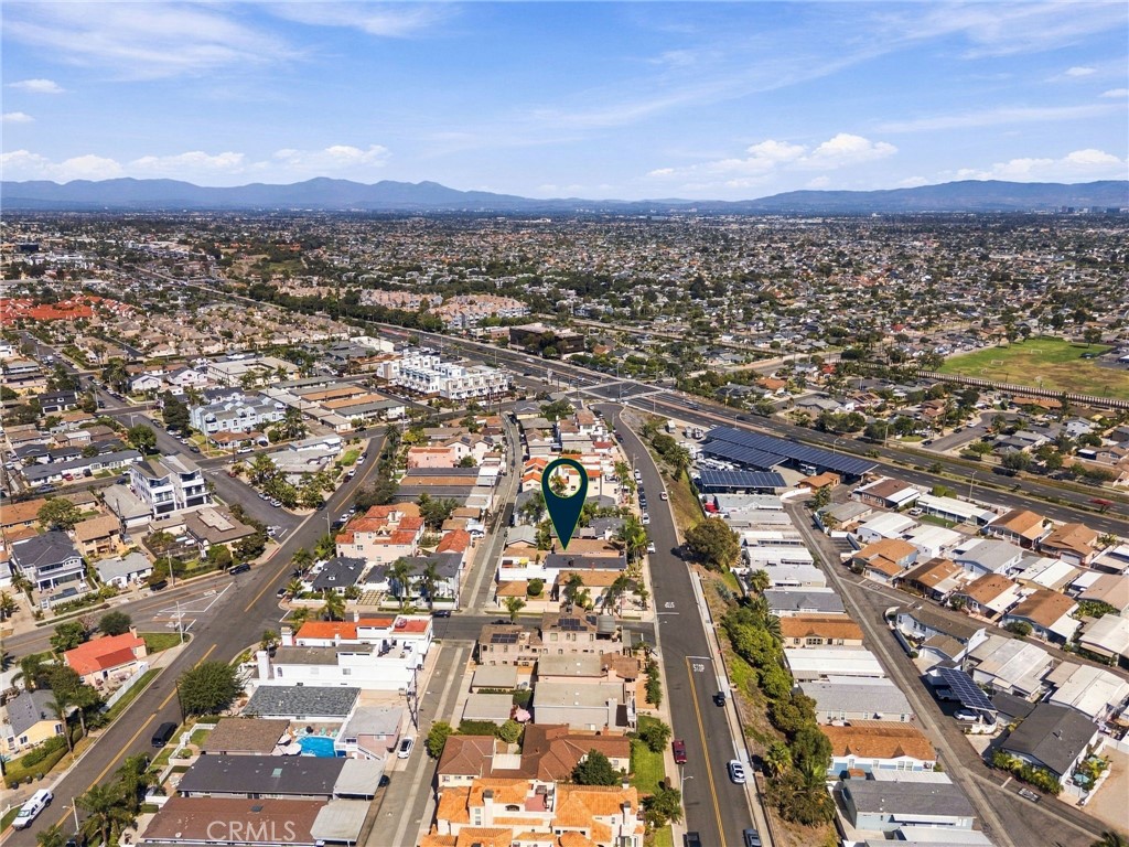 Wide aerial perspective showcases the home's convenient connection to Downtown Huntington Beach and coastal Orange Count - 803 Frankfort Avenue, Huntington Beach CA 92648 - photo 70