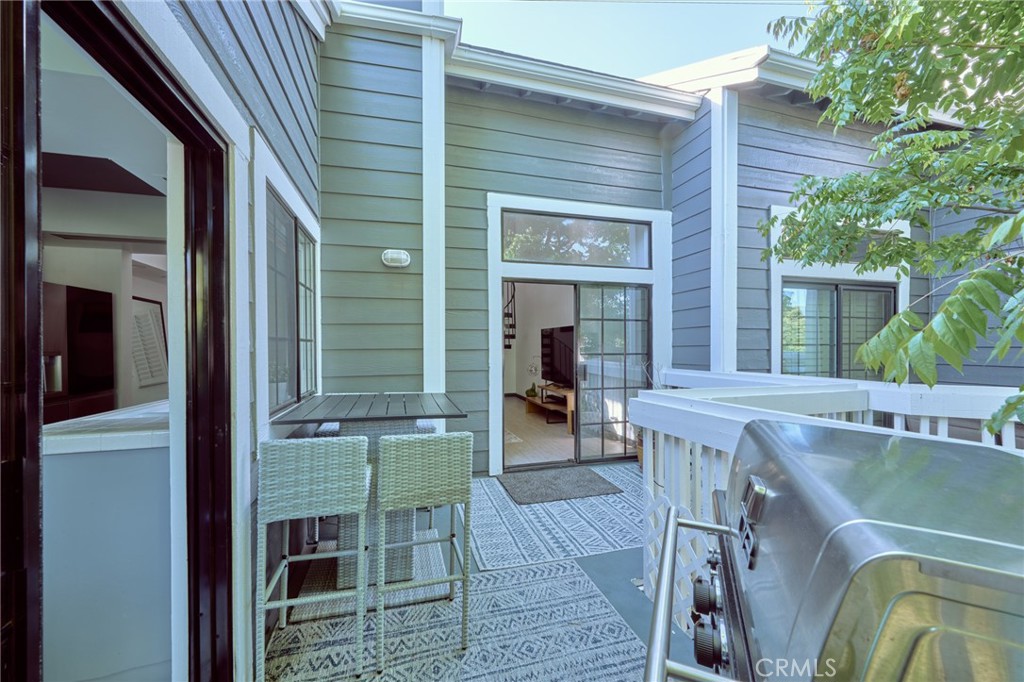 accessing balcony from kitchen - 8132 Atwater Circle 202, Huntington Beach CA 92646 - photo 20