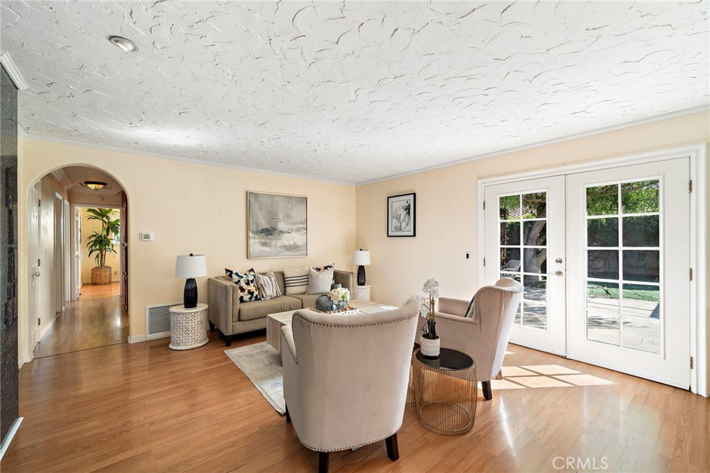 French doors opening to the backyard - 8142 Blaylock Drive, Huntington Beach CA 92647 - photo 5