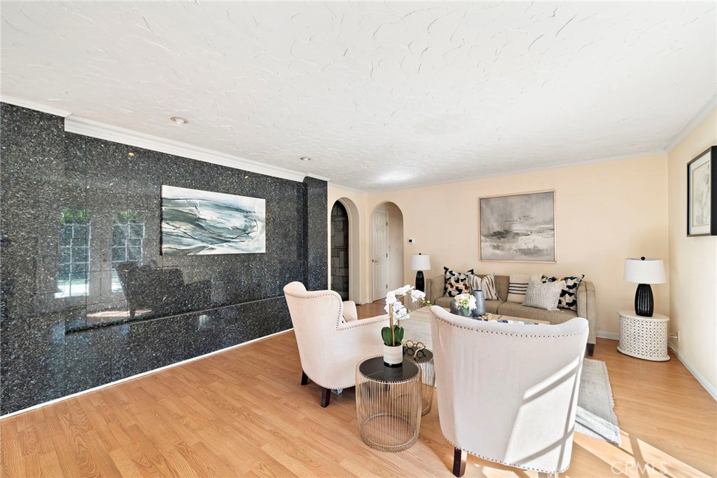 family room showcases an accent wall - 8142 Blaylock Drive, Huntington Beach CA 92647 - photo 6