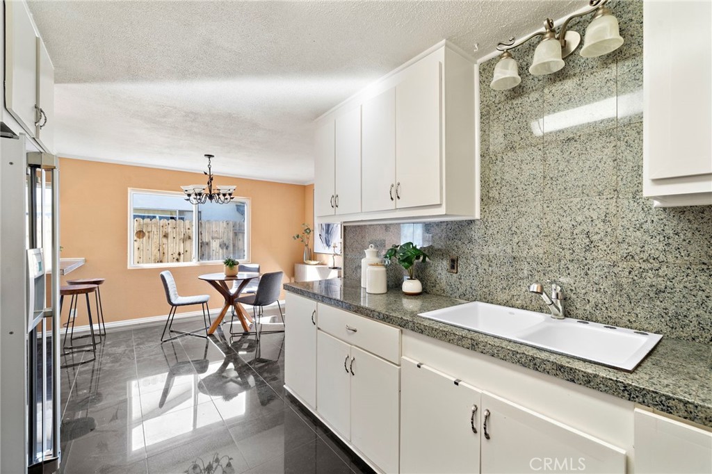 tile flooring - 8142 Blaylock Drive, Huntington Beach CA 92647 - photo 15