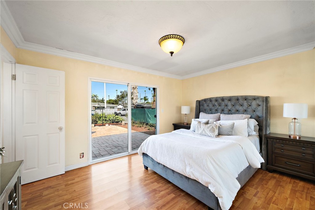 Primary suit has sliding glass door that leads to spacious front courtyard - 8142 Blaylock Drive, Huntington Beach CA 92647 - photo 18