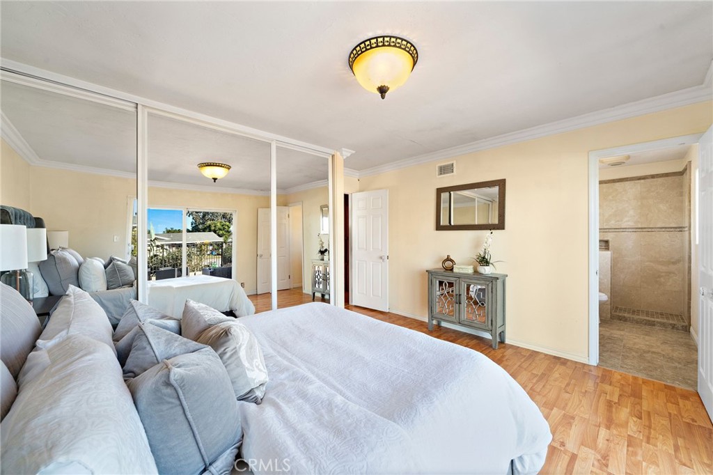 primary suite features mirrored closet doors - 8142 Blaylock Drive, Huntington Beach CA 92647 - photo 19