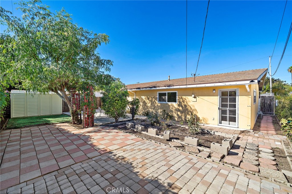 pavers in the backyard - 8142 Blaylock Drive, Huntington Beach CA 92647 - photo 30