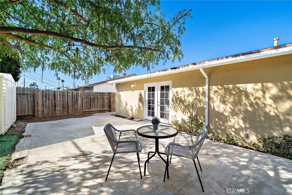 french doors lead to the back patio - 8142 Blaylock Drive, Huntington Beach CA 92647 - photo 32