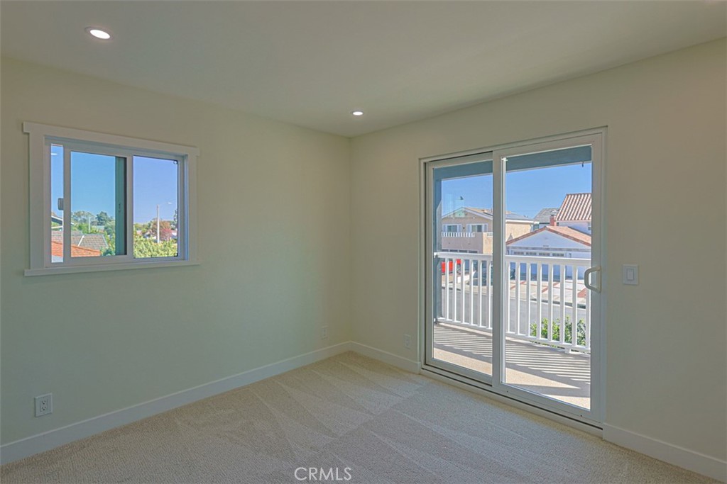 2nd bedroom with balcony - 8331 Snowbird Drive, Huntington Beach CA 92646 - photo 48