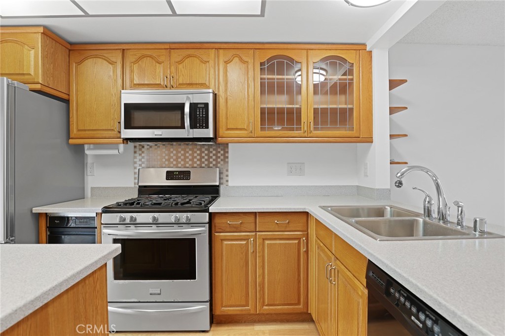 Kitchen island is easy to move or remove. - 8402 Sunbeam Cir, Huntington Beach CA 92646 - photo 11