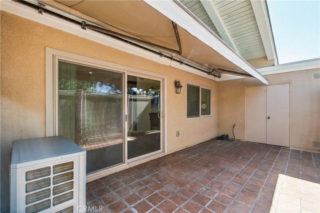 Large tile patio - 8565 Sierra Circle 916A, Huntington Beach CA 92646 - photo 30