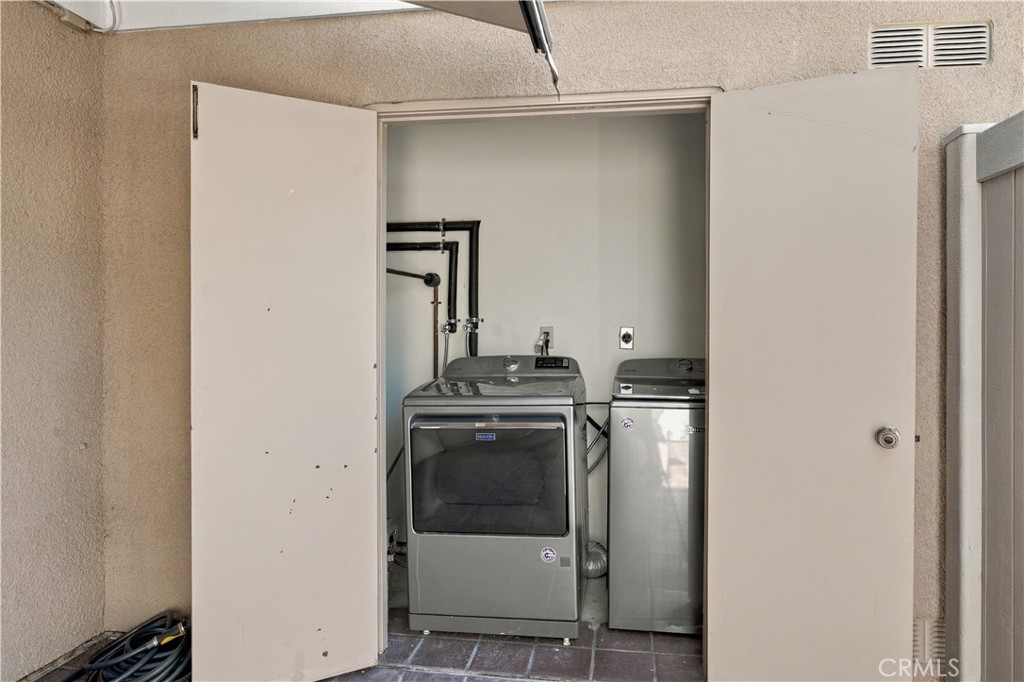 Laundry closet - 8565 Sierra Circle 916A, Huntington Beach CA 92646 - photo 33
