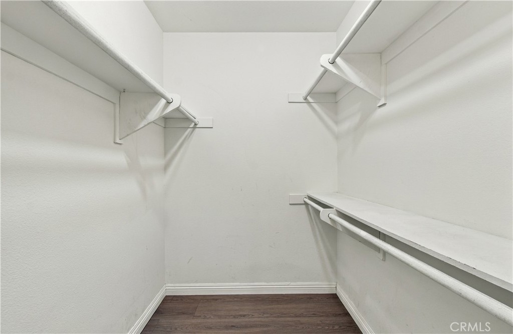 Walk in closet - 8565 Sierra Circle 916A, Huntington Beach CA 92646 - photo 17