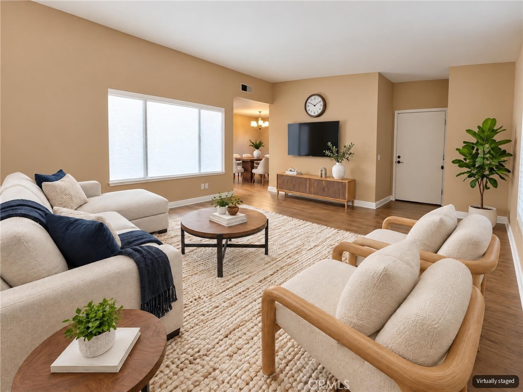 Main living area - "virtually staged" - 8566 Larkhall Circle 813B, Huntington Beach CA 92646 - photo 4