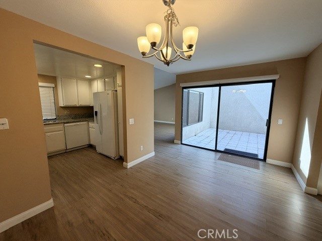 Dining area, kitchen, atrium - 8566 Larkhall Circle 813B, Huntington Beach CA 92646 - photo 11