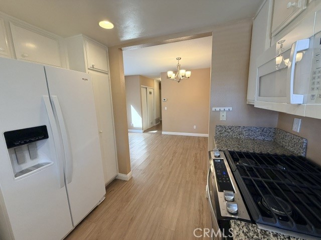 Kithen / dining area - 8566 Larkhall Circle 813B, Huntington Beach CA 92646 - photo 19