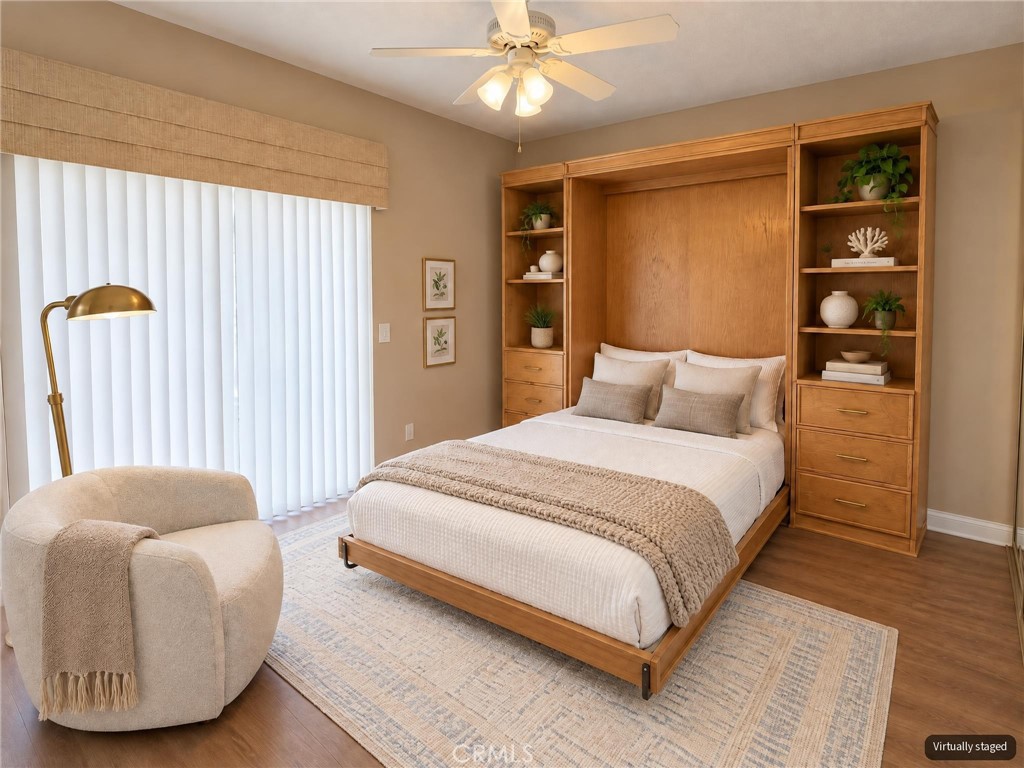 Guest bedroom - "virtually staged" - 8566 Larkhall Circle 813B, Huntington Beach CA 92646 - photo 30