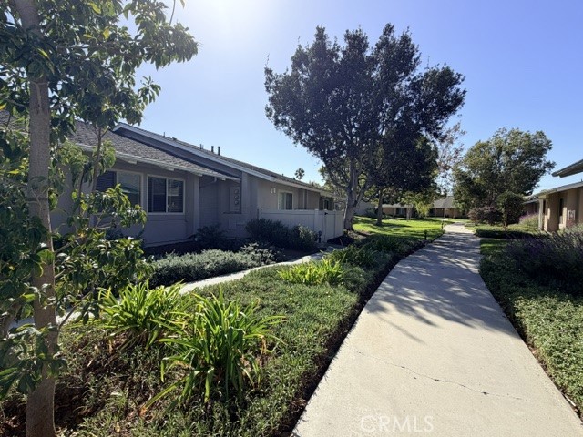 Walkway / greenbelt off Back patio - 8566 Larkhall Circle 813B, Huntington Beach CA 92646 - photo 37