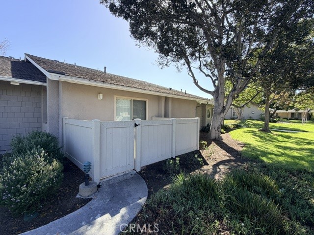 Back patio with gate - 8566 Larkhall Circle 813B, Huntington Beach CA 92646 - photo 38
