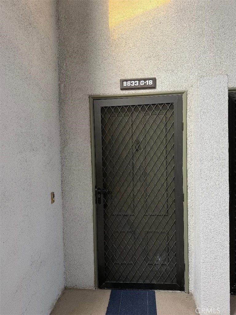 Entry door - 8633 PORTOLA Court, Huntington Beach CA 92646 - photo 5