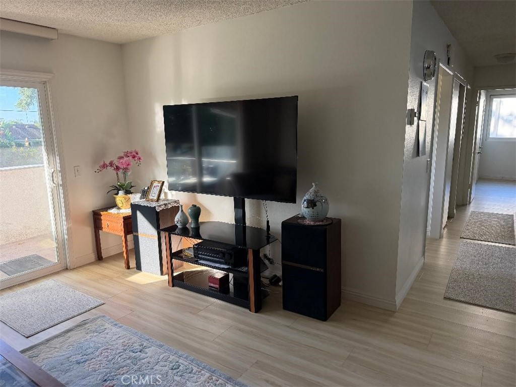 Living room entertainment area - 8633 PORTOLA Court, Huntington Beach CA 92646 - photo 6