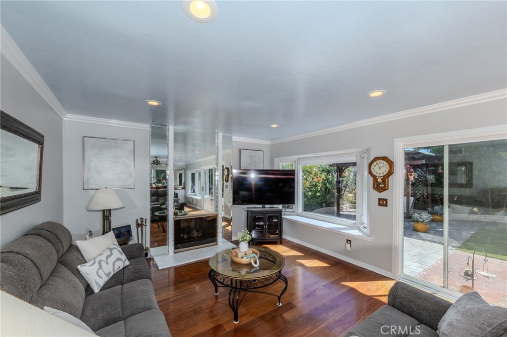 Family Room with Recessed Lighting and Crown Molding - 8712 Mossford Dr., Huntington Beach CA 92646 - photo 9