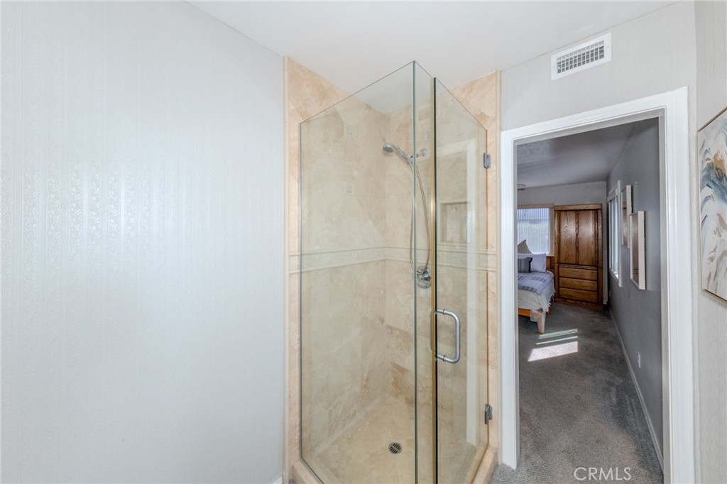 Primary Bathroom Tiled Walk-in Shower - 8712 Mossford Dr., Huntington Beach CA 92646 - photo 24