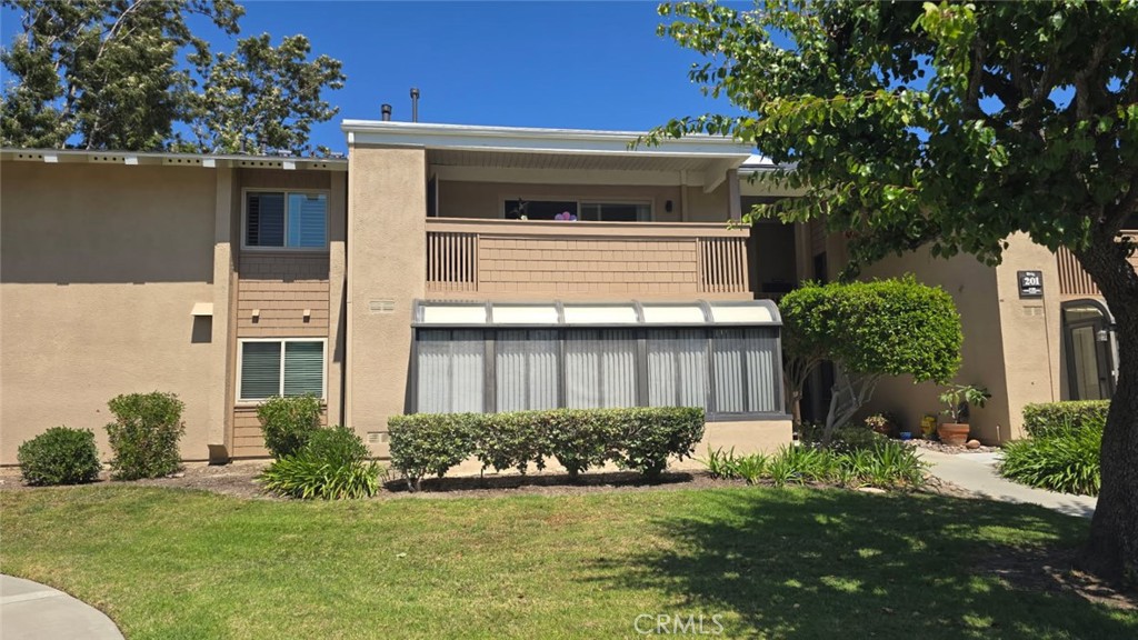 8788 Coral Springs Court 201B, Huntington Beach CA 92646 - photo 1