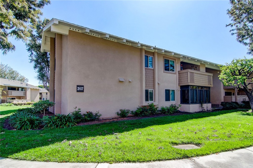 8788 Coral Springs Court 207F, Huntington Beach CA 92646 - photo 1