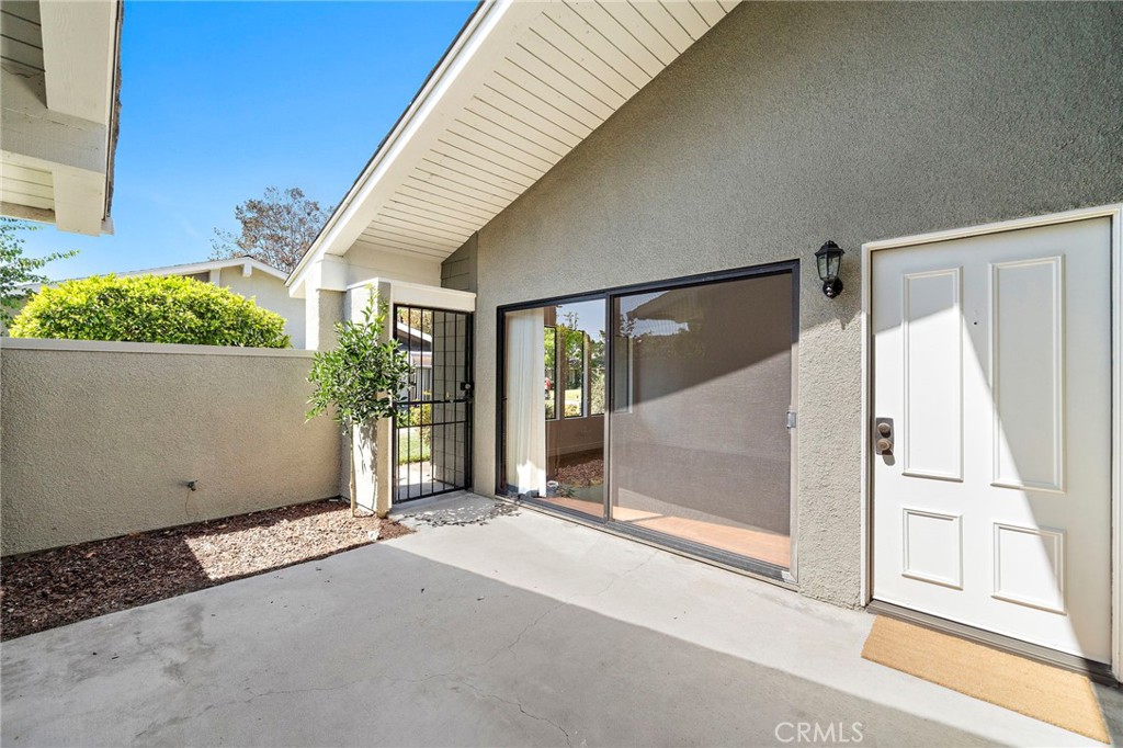 Front Gated Patio - 8932 Biscayne Court 1320E, Huntington Beach CA 92646 - photo 6