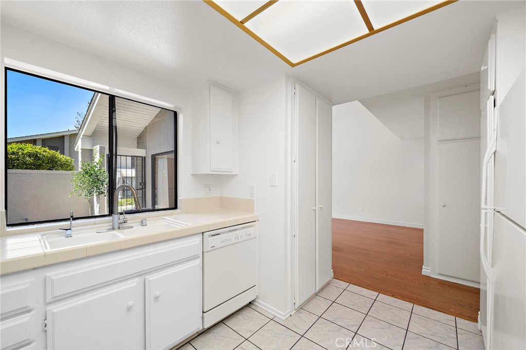New washer and dryer are in the closet - 8932 Biscayne Court 1320E, Huntington Beach CA 92646 - photo 9