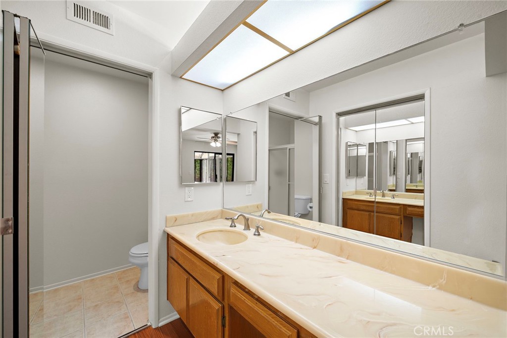 Primary bath - 8932 Biscayne Court 1320E, Huntington Beach CA 92646 - photo 15