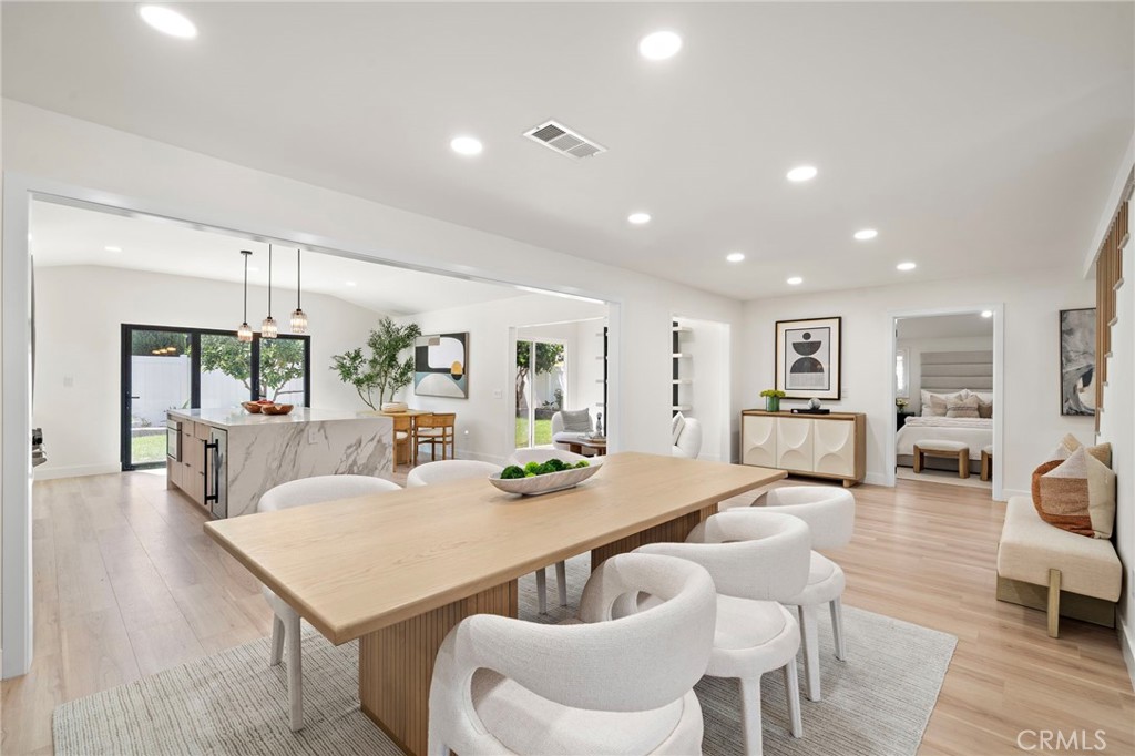 Generous dining area is ideal for gatherings and flows seamlessly into the surrounding living spaces. - 9162 Brabham Drive, Huntington Beach CA 92646 - photo 13