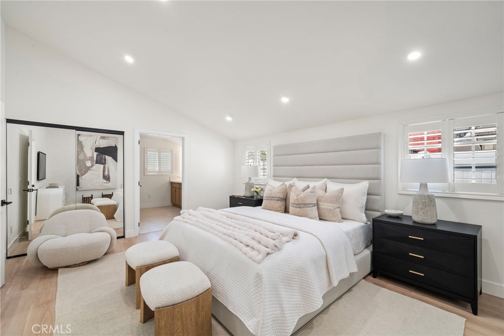 Another view of the main-level primary suite highlights its generous proportions and refined finishes. - 9162 Brabham Drive, Huntington Beach CA 92646 - photo 31